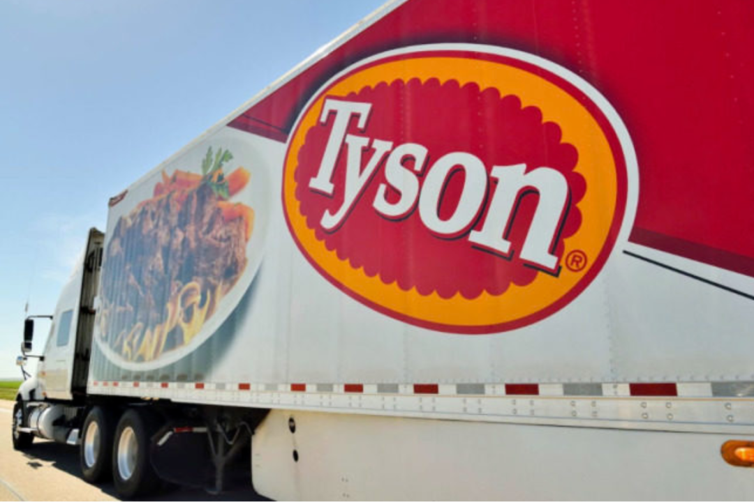 semi truck and trailer with Tyson logo on trailer